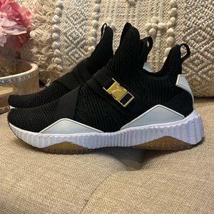 Puma Defy Varsity Knit Mid-Top Sneakers